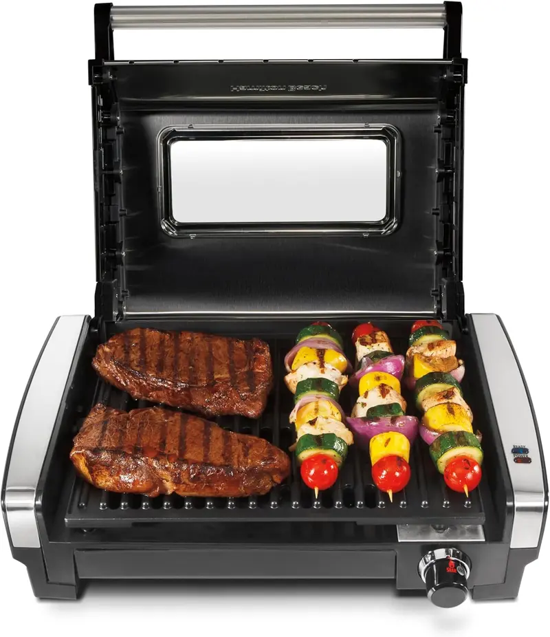 Elektryczny grill wewnętrzny z pokrywą ze szkła hartowanego i regulacją temperatury do 232 °C.