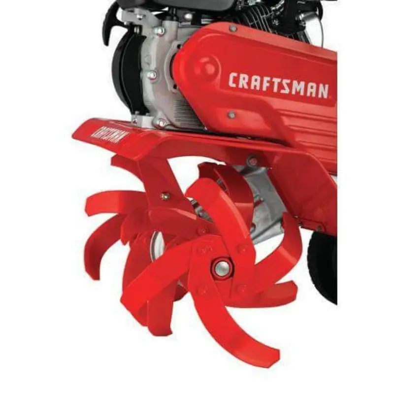 Glebogryzarka Craftsman z zębami przednimi. Prążkowana i żebrowana konstrukcja zapewnia efektywną uprawę gleby.